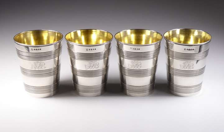 Set of four George III silver beakers straight tapered